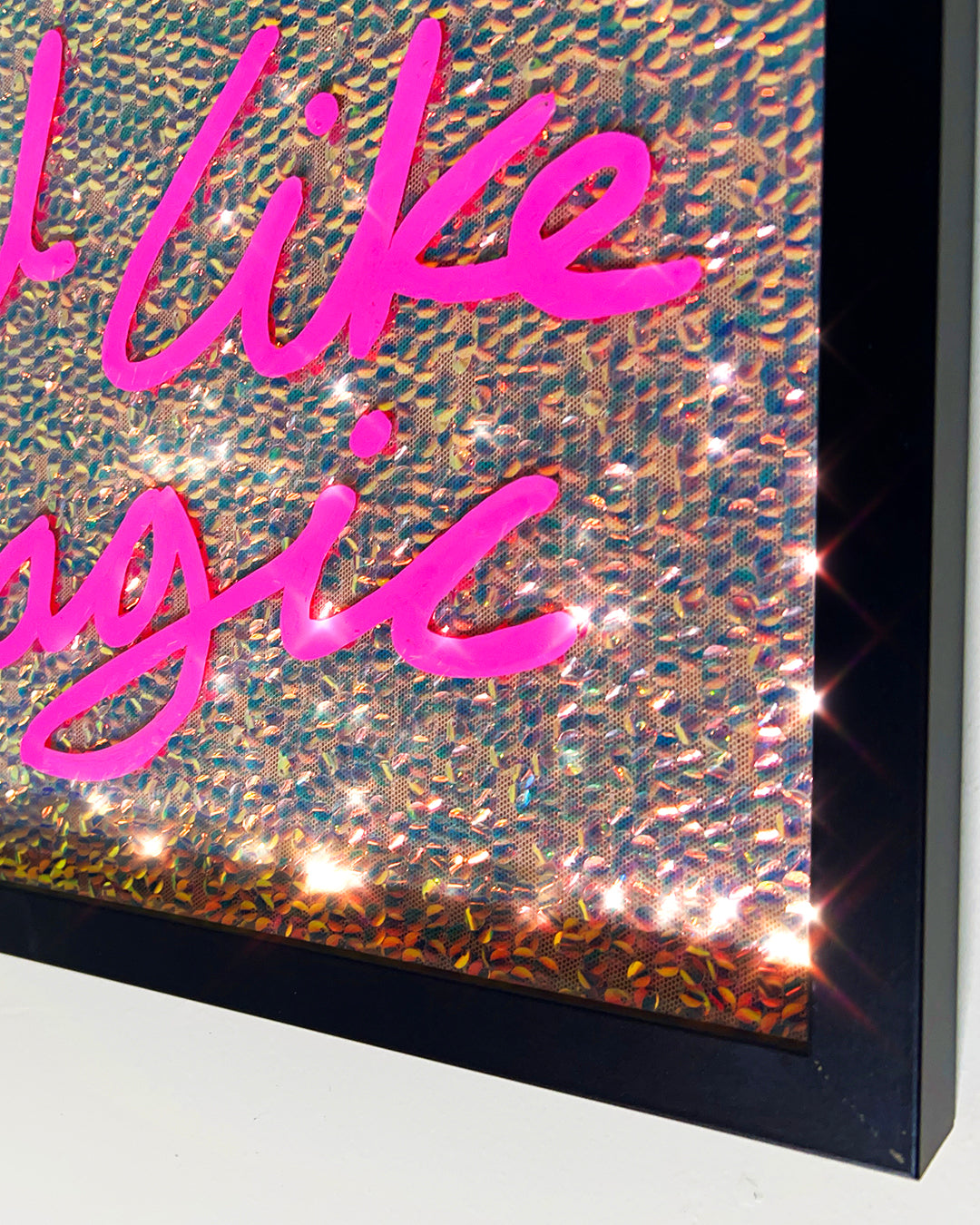 Grateful people. Pink ink over iridescent warm goid sequins. Medium.