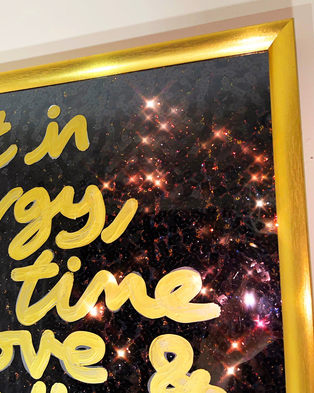 Results will find you. Luxurious gold ink over black sequins. Medium.