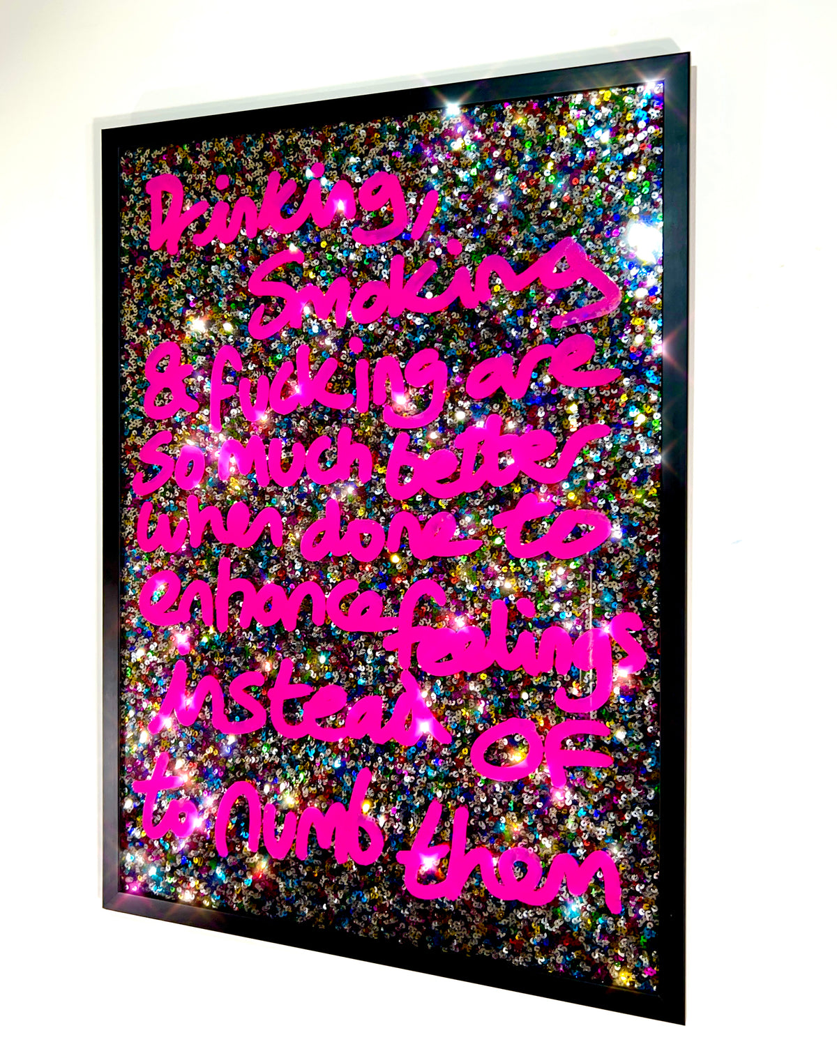 Enhance feelings. Pink over multicoloured sequins.