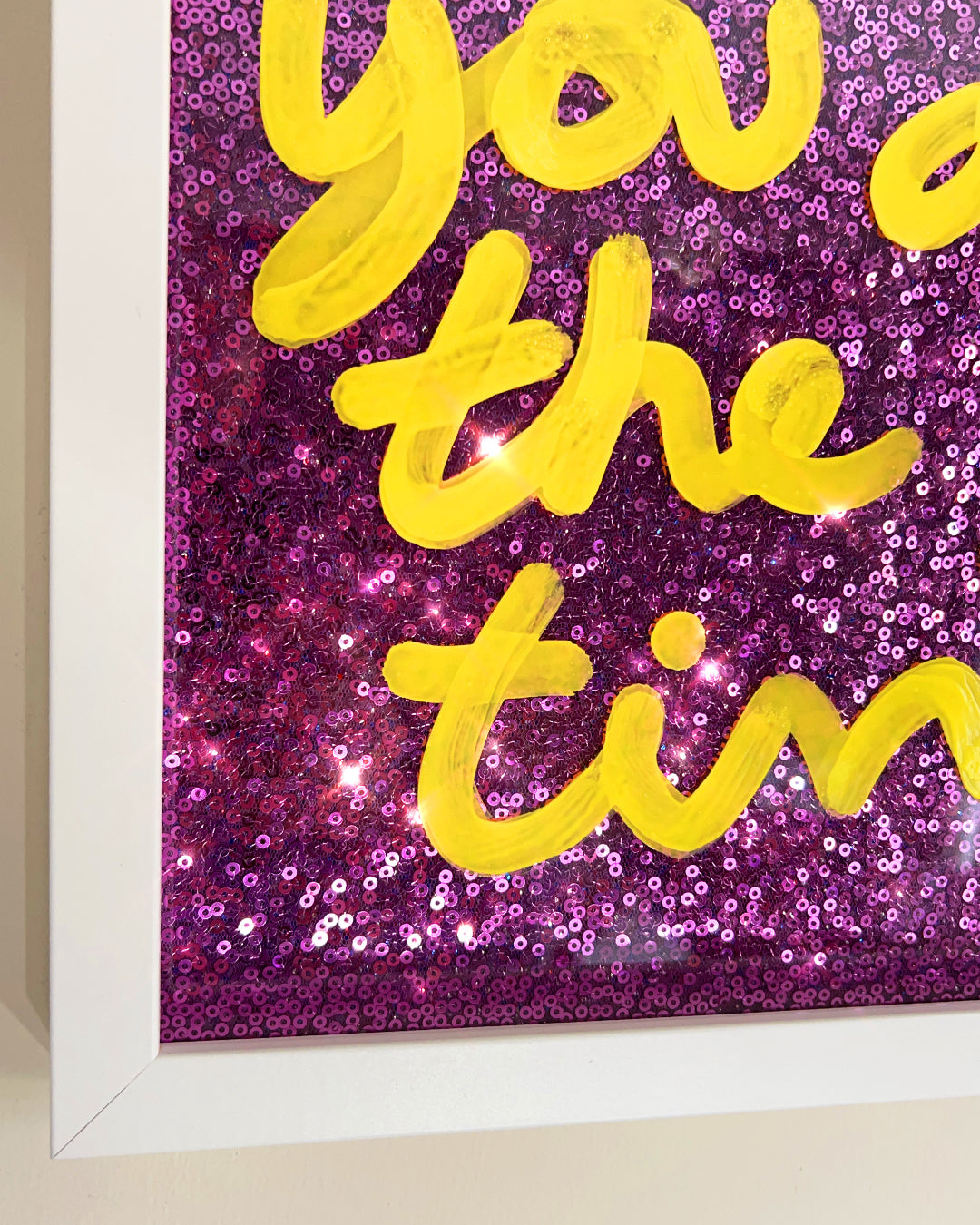 Good times. Yellow ink over pink/purple sequins.