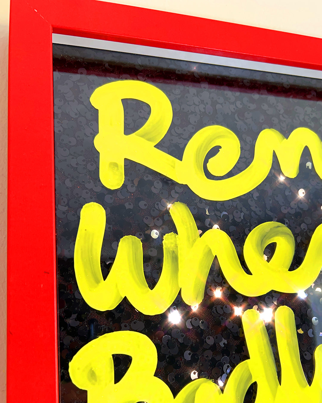 Remember when. Yellow ink over black sequins.