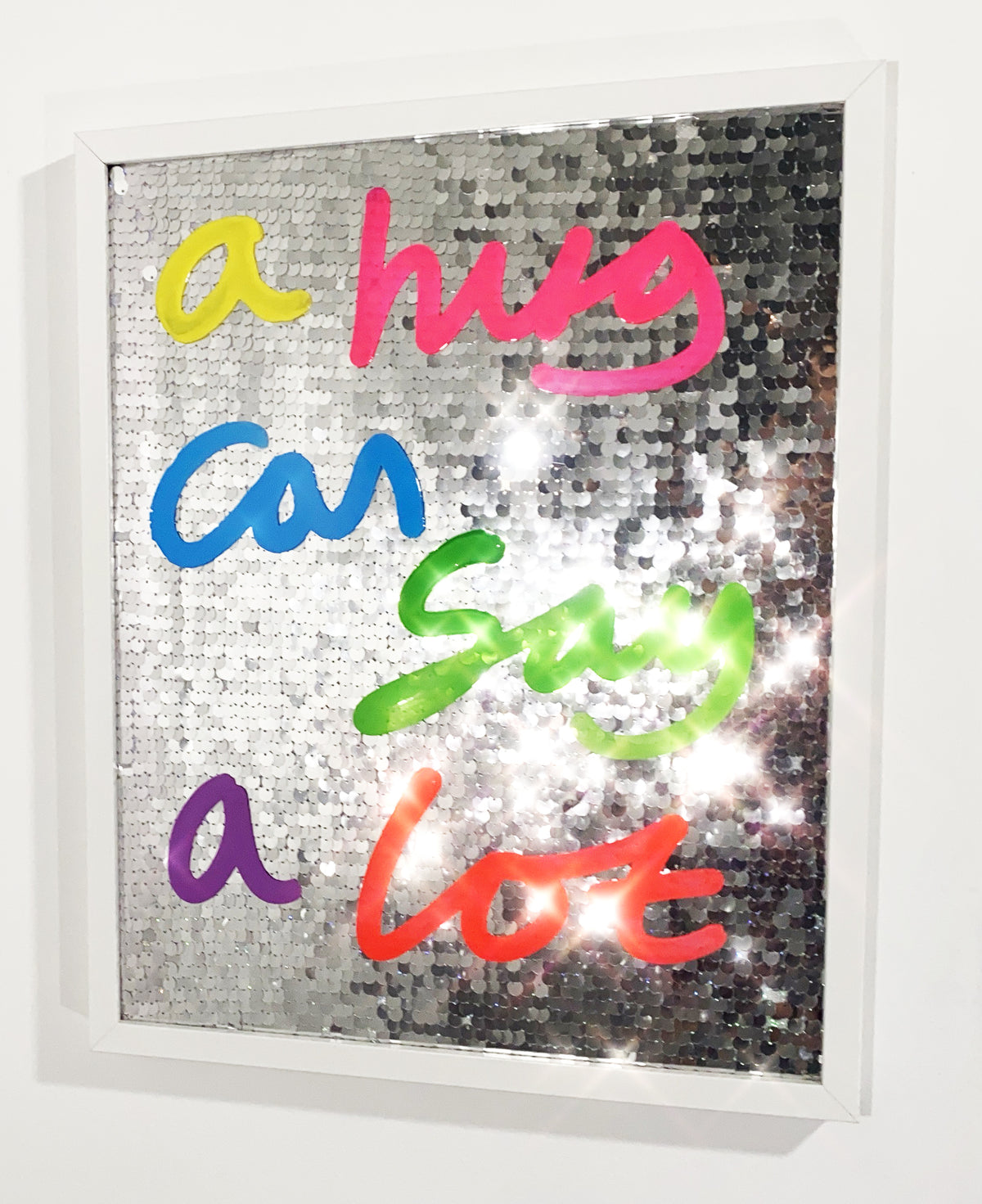 A hug, ink over silver mirrored sequins.