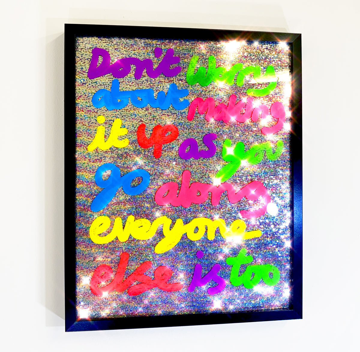 Making it up, ink over iridescent silver sequins.