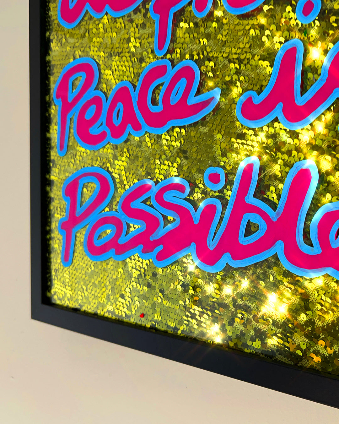 Proof peace is possible. Funky pink/blue combo ink over vibey yellow sequins. Medium