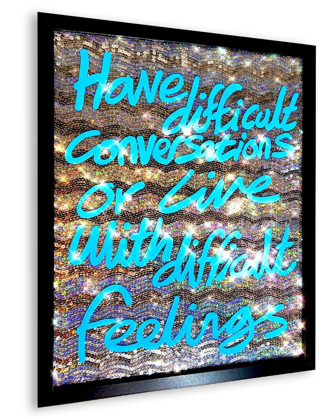 Difficult conversations. Sky blue ink over iridescent silver sequins. Medium.