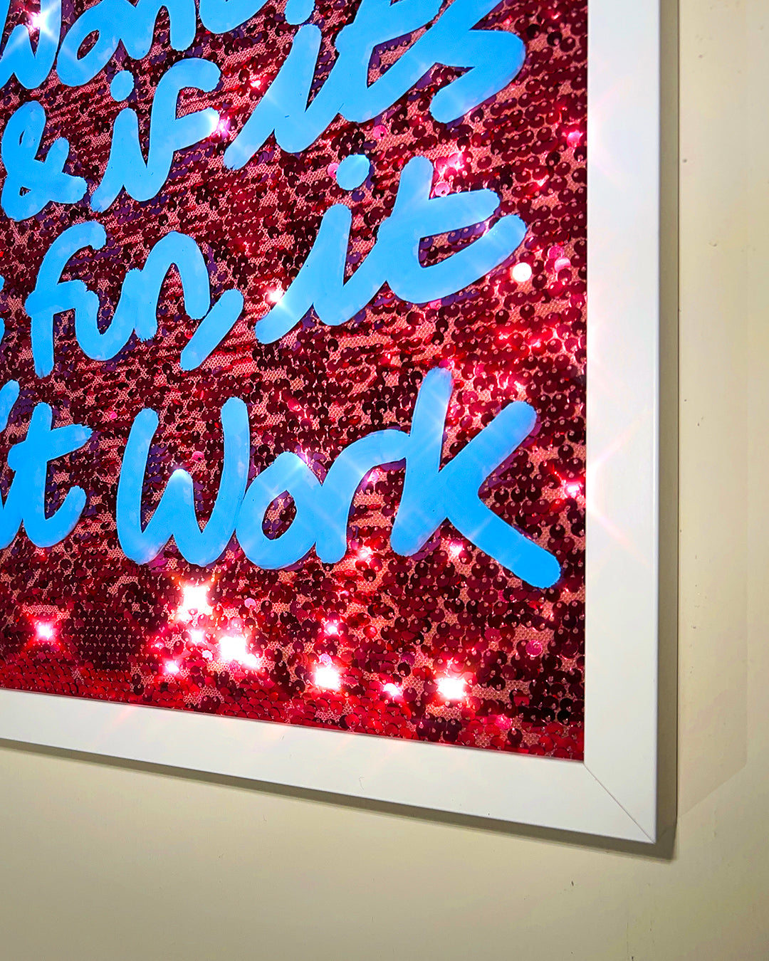 Playful. Sky blue ink over pink sequins. Medium.