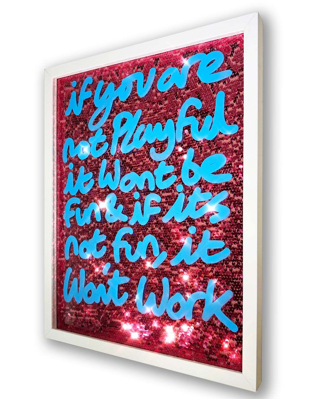 Playful. Sky blue ink over pink sequins. Medium.