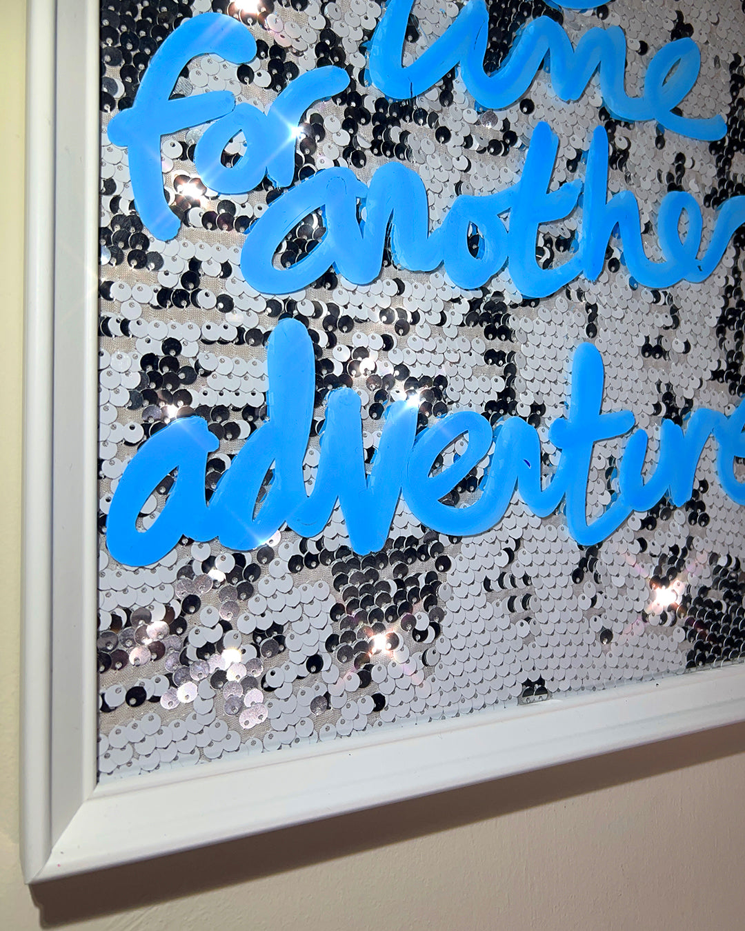 Adventure. Sky Blue ink over white/silver sequins. Small