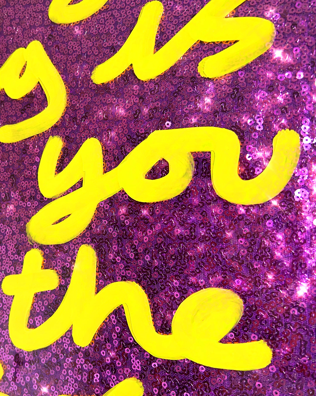 Right timing. Yellow ink over pink/purple sequins.