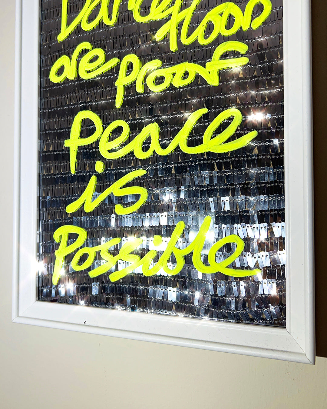 Proof peace is possible. Fluro yellow over silver disco sequins. Extra Small.