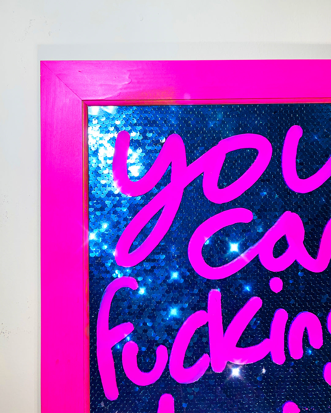 Do it.  Pink ink over blue sequins. Medium.