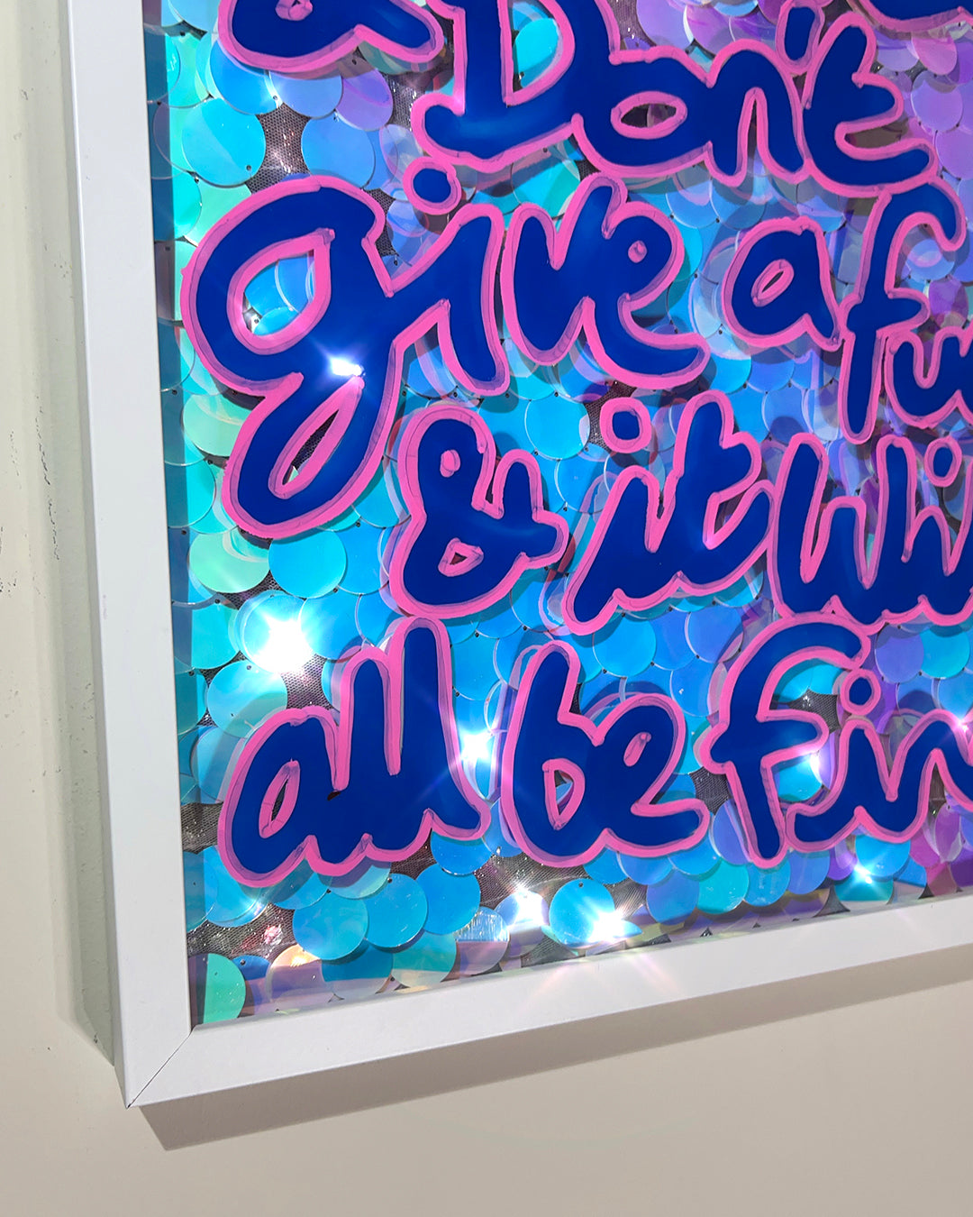 Dress well.  Blue & pink ink over giant iridescent blue/pink sequins. Medium.