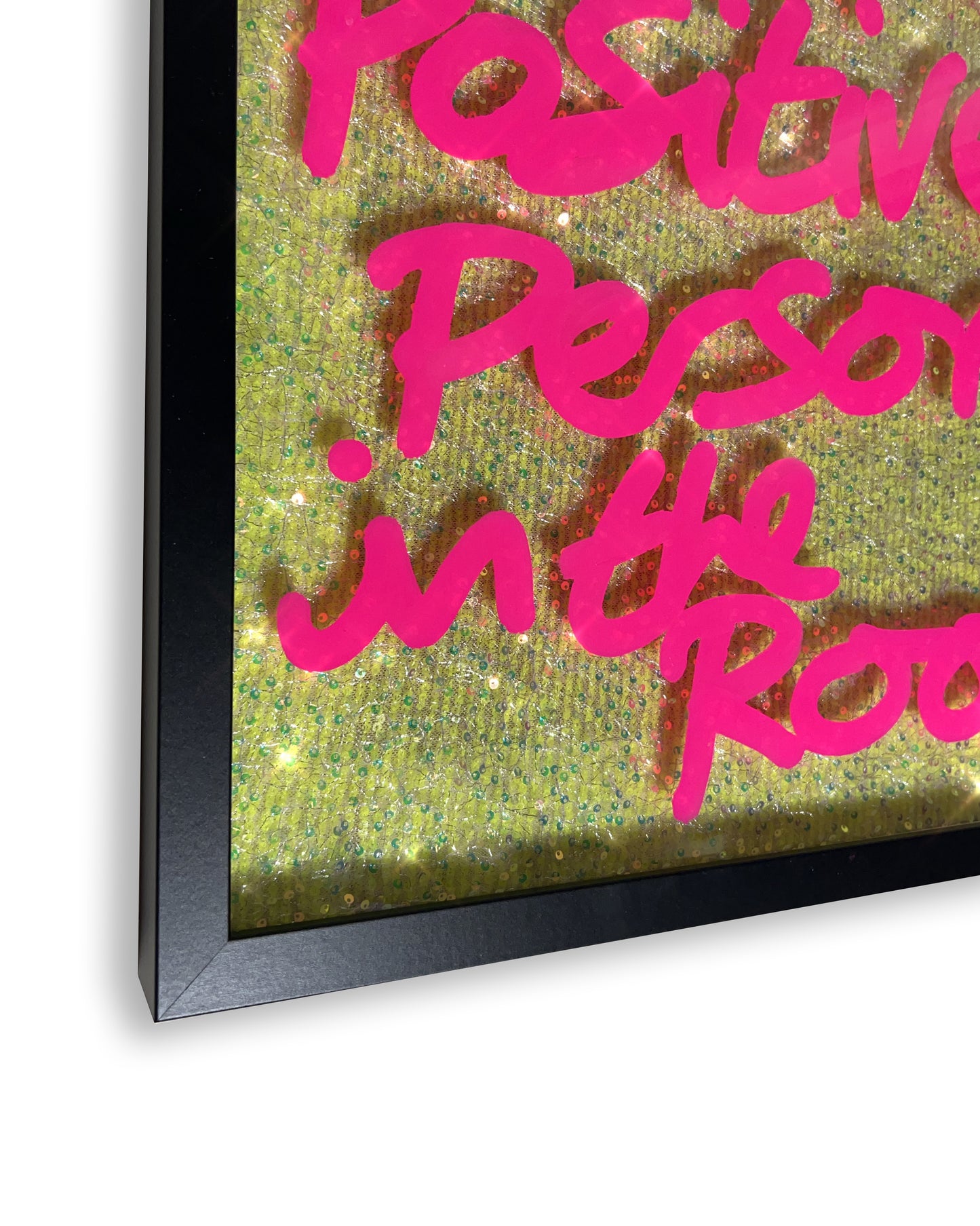 Positive person. Hot pink ink over muted neon yellow sequins. Medium.