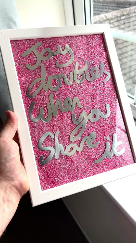 Joy Doubles. Liquid chrome over pink sparkling fabric. Extra Small.