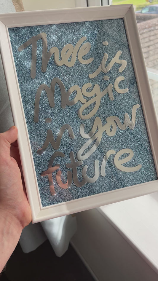 Magic. Liquid chrome over blue sparkling fabric. Extra Small.