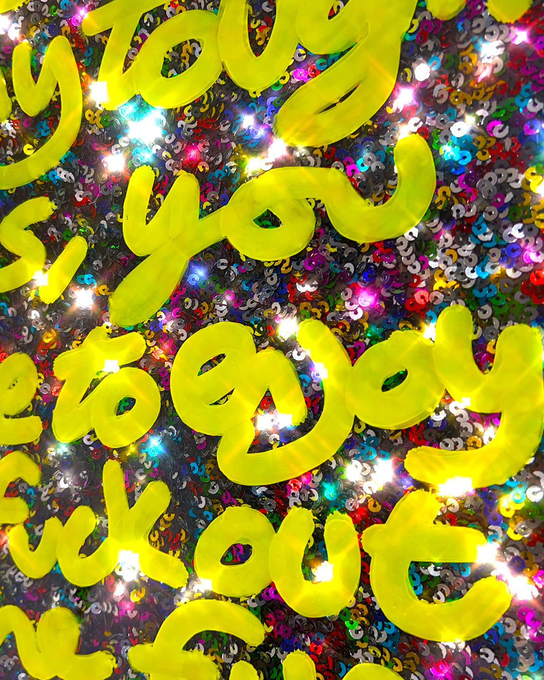 Tough parts. Yellow ink over multi-coloured sequins.